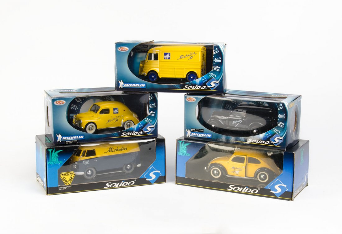 MICHELIN: A group of 5 die-cast Michelin commercial: MICHELIN: A group of 5 die-cast Michelin commercial model vehicles, 1:18, all in original packaging; made by Solido and Prestige