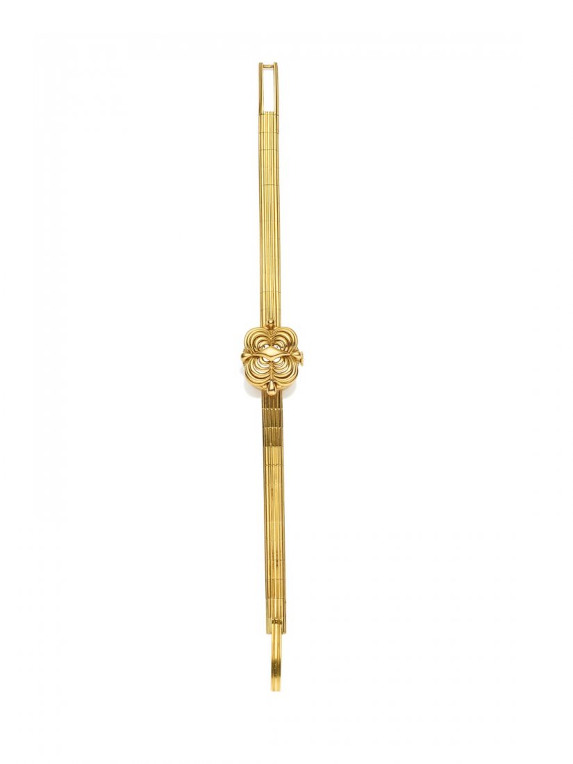 A Lady's cocktail wristwatch, International Watch Co.,: A Lady's cocktail wristwatch, International Watch Co., manual, concealed face, silver dial with applied gold baton numerals.