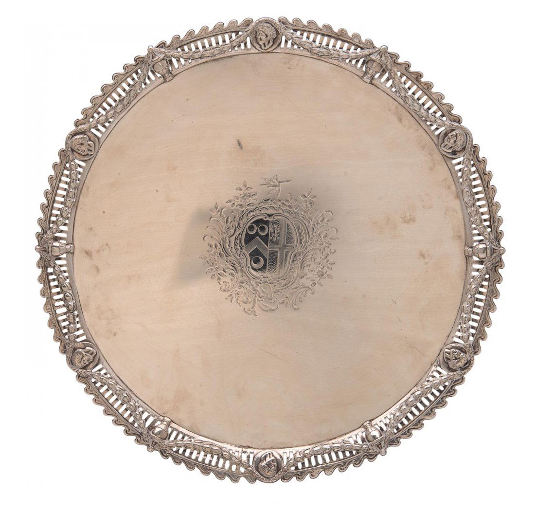 A George III Sterling Silver Circular Salver by John: A George III Sterling Silver Circular Salver by John Carter II, London 1770 with pierced rim and contemporary coat of arms 37cms diameter, 1290 grams The arms are those Baskerville impaling Jaco