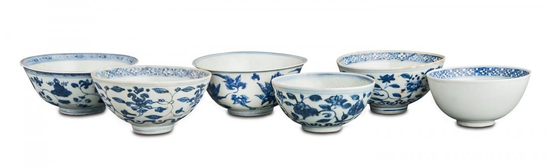 Six Chinese blue and white bowls, late Ming dynasty,: Six Chinese blue and white bowls, late Ming dynasty, 16th -17th Century each one decorated with floral scrolls from 11.8cm to 15cm diameter