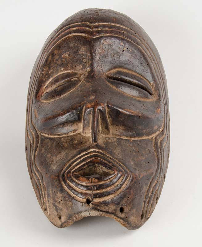 An Indonesian carved ceremonial mask, mid 20th century (1 of 1)