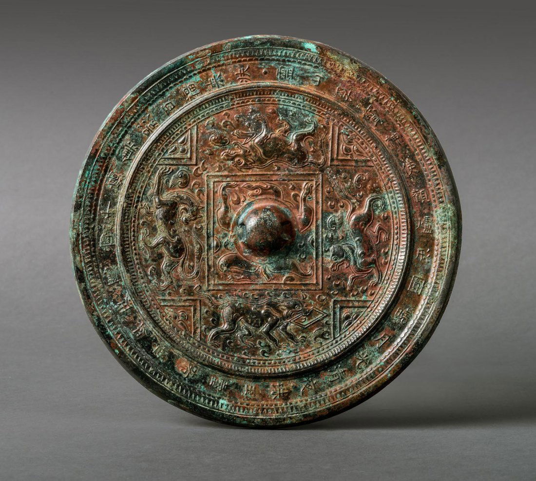 A Chinese archaic silvered bronze mirror, Han Dynasty (1 of 1)