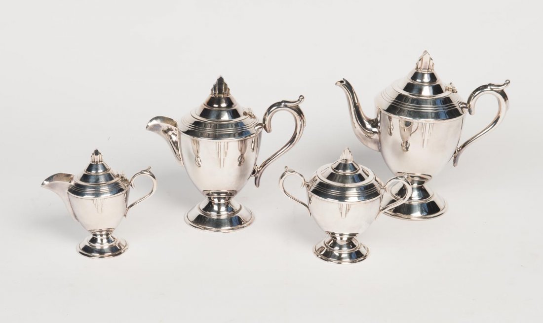 An art deco four piece silver plated tea service made: An art deco four piece silver plated tea service made for Sir John Bennett Department Store, Melbourne. Tallest: 21cm.