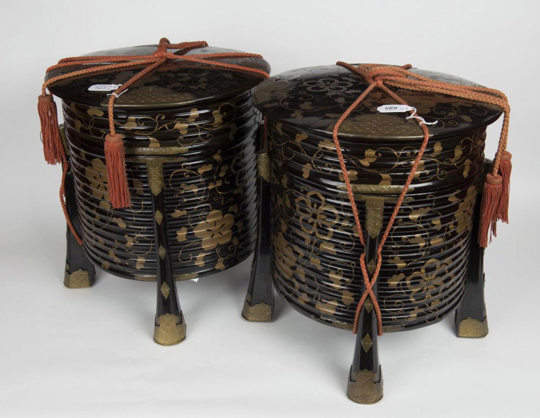 A pair of large Japanese black lacquer Kai-Oke (shell: A pair of large Japanese black lacquer Kai-Oke (shell game boxes) decorated with gilt trailing peonies, Edo period 43 cm diameter, 40 cm high wooden cases