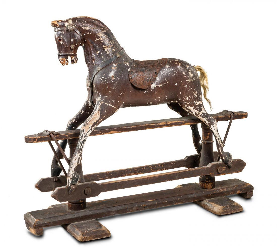 A charming painted and carved wooden rocking horse with (1 of 1)