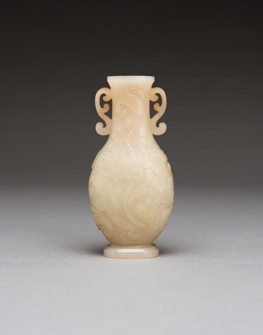 A Chinese pale celadon jade twin handled (1 of 2)