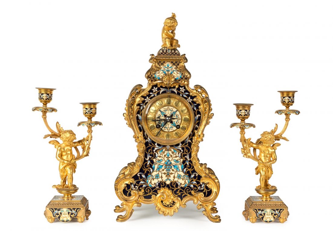 A French gilt bronze and champlevÃ© clock garniture, (1 of 1)