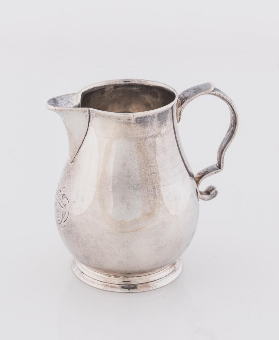 A George I Britannia standard silverÂ cream jug by (1 of 1)