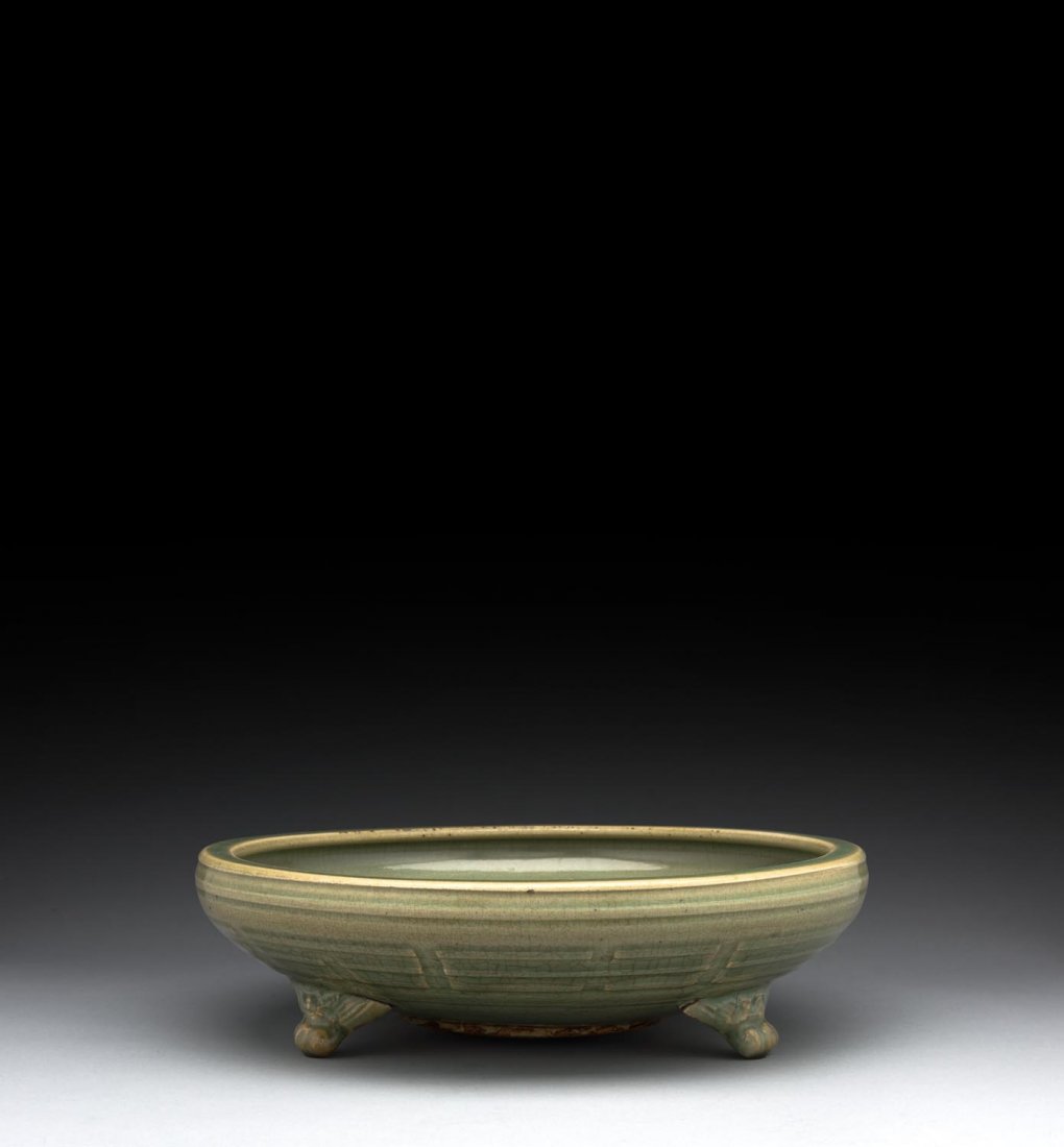 A Chinese Longquan celadon tripod censor, Ming dynasty, (1 of 2)