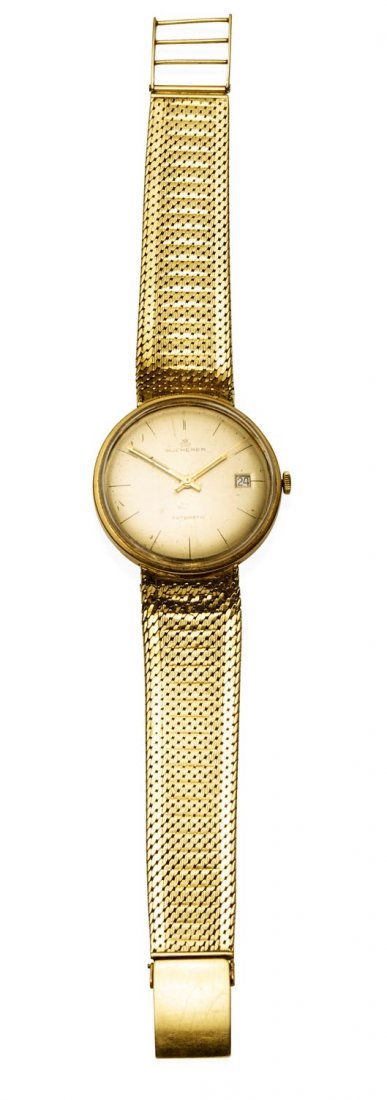 A Gentleman's gold wristwatch, Bucherer, circa 1960's.: A Gentleman's gold wristwatch, Bucherer, circa 1960's. Automatic. 33mm. Circular case with gold dial and painted black baton numerals. Centre sweep seconds and date aperture. Dial signed. 24 j
