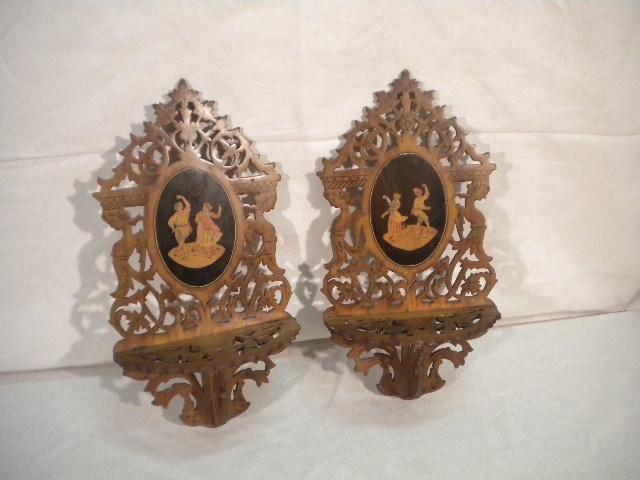 Pair of Sorrento wall-brackets: Pair of Sorrento wall-brackets inlaid with figures. Second half of 19th Century. H: cm 36, L: cm 20, D: cm 10 (H: 14,1 inch, L: 7,8 inch, D: 3,9 inch)