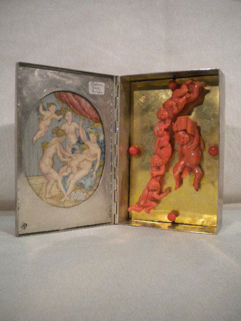French erotic box: French metal erotic box with sheepskin miniatures and coral figures inside. H: cm 4, L: cm 15,5, D: cm 10 (H: 1,5 inch, L: 6,1 inch, D: 3,9 inch)