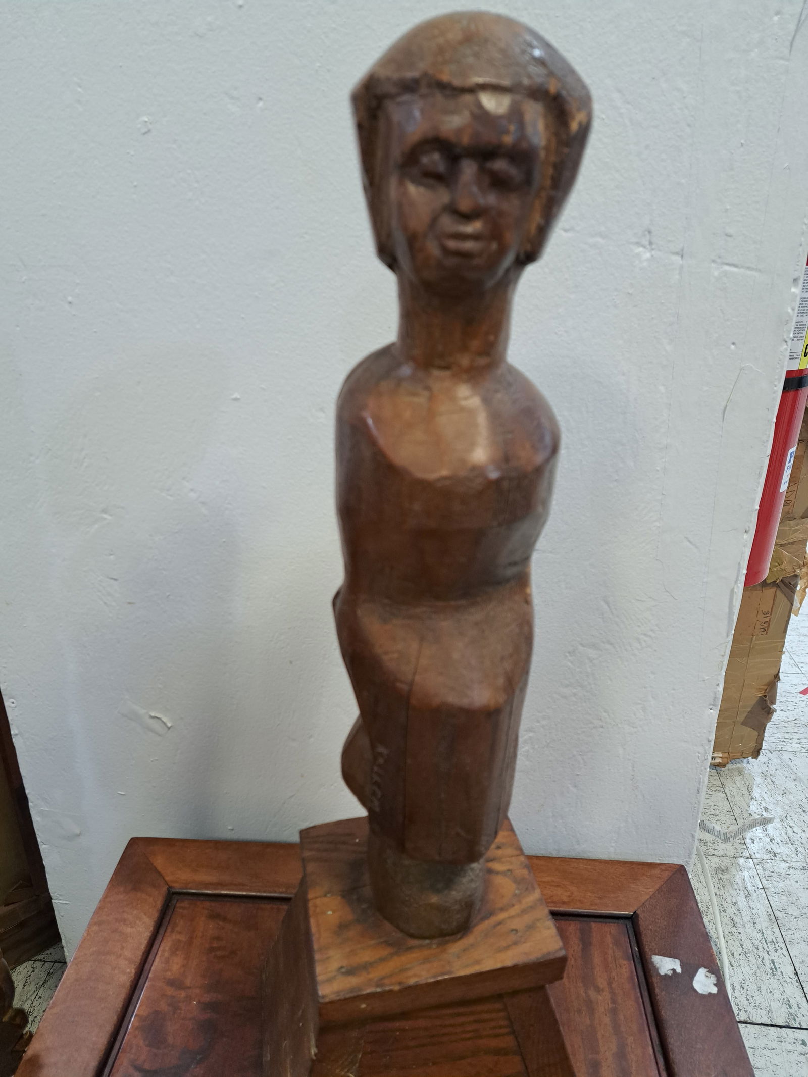 A unique sculpture of a primitive standing woman figure by Kallem: Figural wood Sculpture by Herbert Kallem (1904-1994).Born in Philadelphia spent most of his career in New York City as both a sculptor and an art teacher at the School of Visual Arts and New York Univ