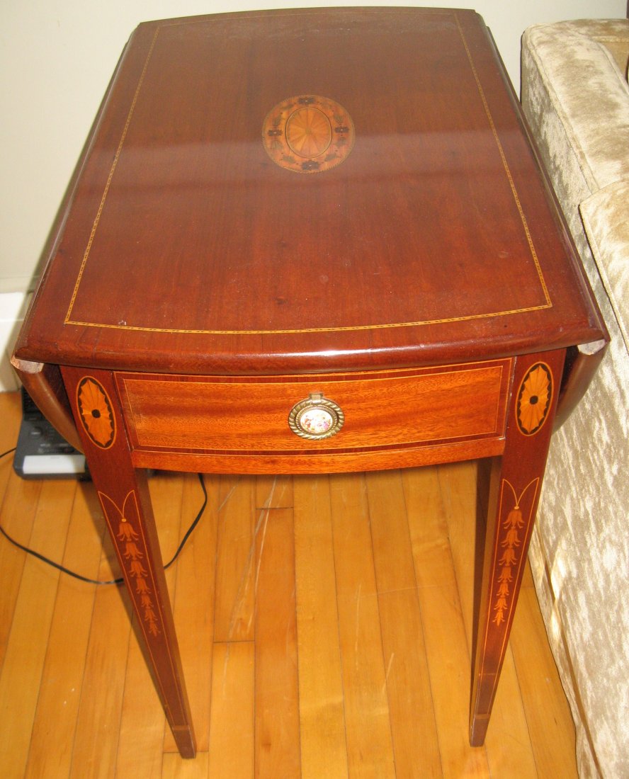 One of a pr. of Pembroke tables: One of a pair of fine inlaid mahogany drop leaf Pembroke tables (Bussolini, W. Quincy, MA)