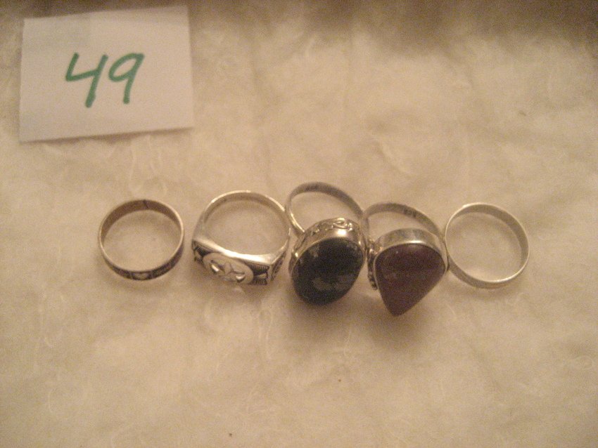 5 Incredible Sterling Silver Rings: A purple agate, size 5.5; an obsidian snowflake, size 6.5; a star, size 7; a heart, star, and arrow, size 6; and a brushed silver, size 7. Weight is almost 19 grams. All five for one money.