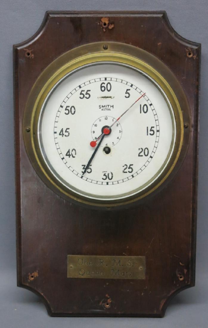 SMITH'S ASTRAL NAUTICAL SHIP'S CLOCK: MOUNTED ON PANEL; ORIGINALLY FROM THE R.M.S. QUEEN MARY; 9" DIA.