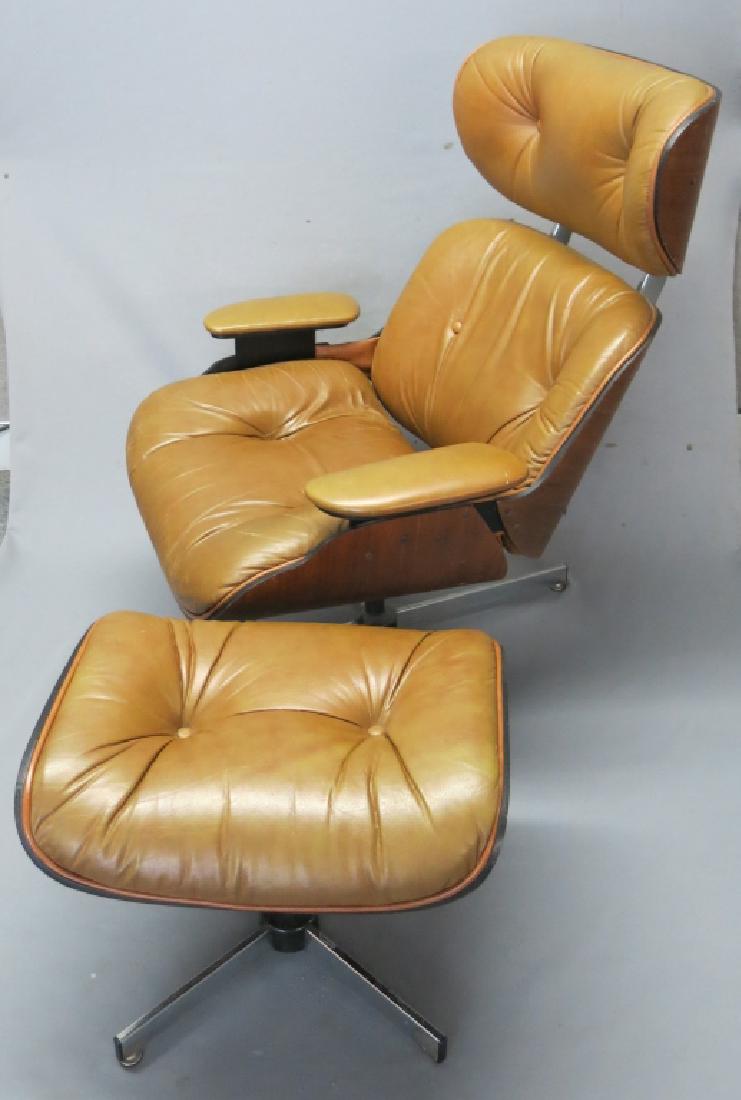 EAMES STYLE LEATHER LOUNGE CHAIR AND OTTOMAN: MANUFACTURED BY SELIG