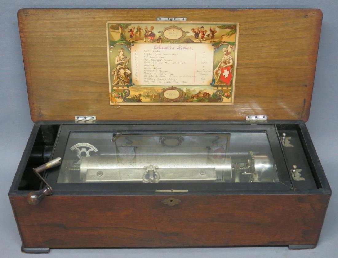 SWISS ROSEWOOD MUSIC BOX WITH 13 1/2" CYLINDER: CASE MEASURES 27 1/4" X 11 1/4" X 7 3/4"; TWELVE TUNES (AIRS); NUMBERED 78836; PLAY/STOP, CHANGE/REPEAT; ONE TINE MISSING
