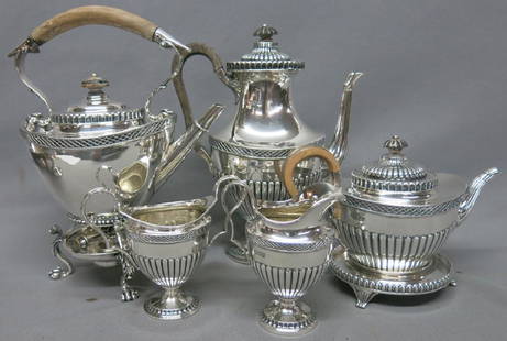 ENGLISH STERLING SILVER TEASET - LONDON 1901: BY PETER HENDERSON DEERE; TEAPOT ON TRVET, CHOCOLATE POT, HOT WATER ON WARMING STAND, SUGAR AND CREAMER; 124.6 OZT. INCLUSIVE OF WOODEN HANDLES; BURNER HAS A DIFFERENT MARK (SHOWN IN LAST PHOTO)