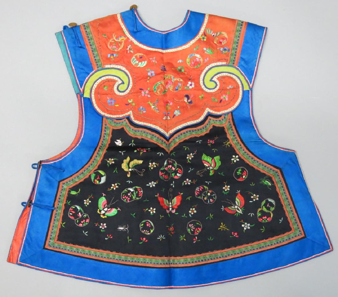 CHINESE EMBROIDERED SILK CHILD'S VEST: DETAILED DESIGN OF BUTTERFLIES AND FLOWERS; 18" LONG