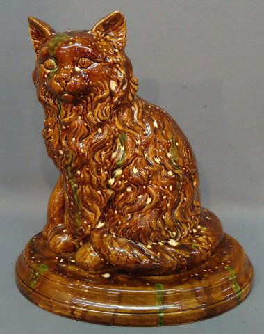 ROCKINGHAM EARTHENWARE FIGURE OF A CAT, AGE?: ROCKINGHAM EARTHENWARE FIGURE OF A CAT 14" TALL, AGE?