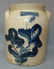 61: 2-GALLON STONEWARE CROCK W/ COBALT BLUE DECORATION