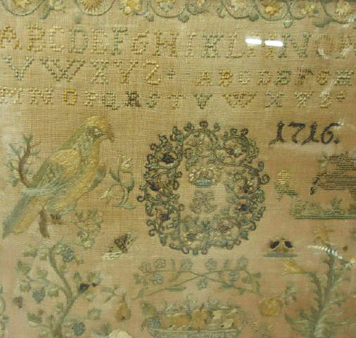HANDSEWN 18TH C. ENGLISH SAMPLER DATED 1716: WITH ALPHABET, BIRDS, STAG, FRUIT & BARGELLO STITCHES, 12" X 11"