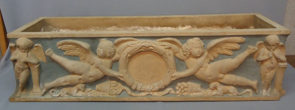 1915 ROOKWOOD POTTERY FLOWERBOX: NEOCLOASSICAL RELIEF DESIGN; DAMAGE TO CORNERS, DRAINAGE HOLES ADDED, NUMBERED 3081Y; 45" X 14" X 11 1/2"