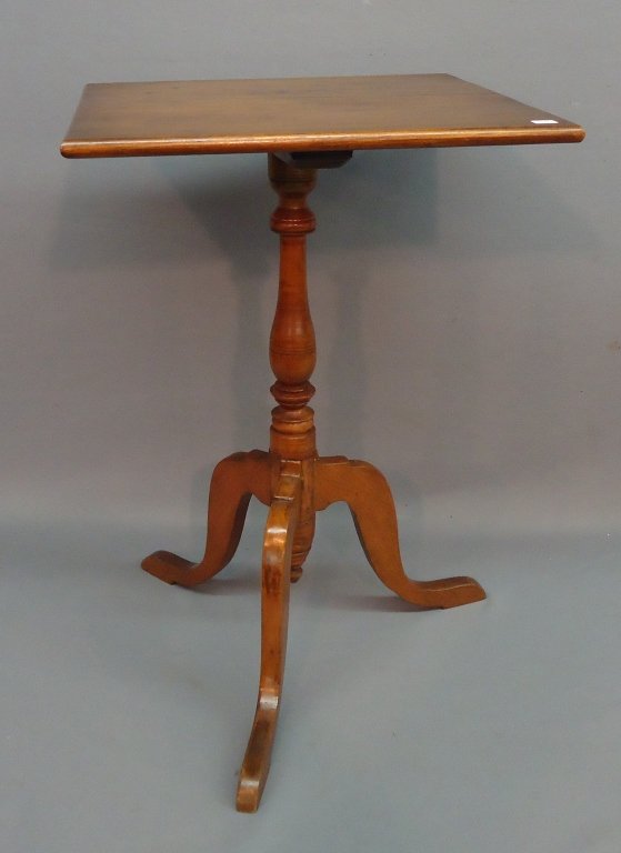 EARLY MAPLE SNAKEFOOT CANDLESTAND: WITH SQUARE TOP AND TURNED DROP FINIAL