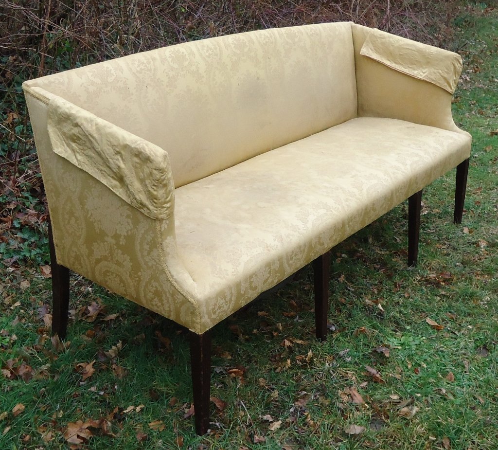 PERIOD HEPPLEWHITE MAHOGANY SOFA: WITH REEDED FRONT LEGS AND GOLD UPHOLSTERY; OLD REPAIRS MADE TO BACK LEG, SIZE: 70" LONG X 27" DEEP X 35" HIGH