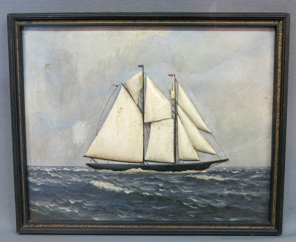 THREE DIMENSIONAL OIL PAINTING OF A SCHOONER: WITH CARVED WOOD SAILS AND HULL; 8" X 10", PAINTED ON WALL BOARD