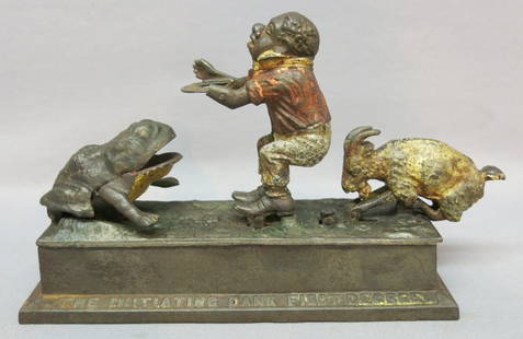 INITIATING MECHANICAL BANK - FIRST DEGREE: MADE BY MECHANICAL NOVELTY WORKS; NEW BRITIAN, CT.; WORKING CONDITION; ONE HAND OF MAN BROKEN AND MISSING10 1/4" X 3 1/2" X 7"