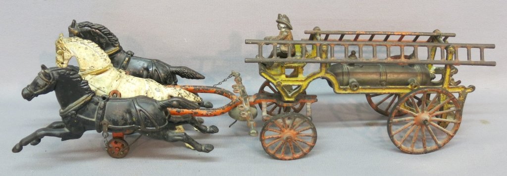 CAST IRON HORSE DRAWN LADDER TRUCK: TWO LADDERS; ONE 12" & ONE 8" LONG; 23" LONG TOTAL