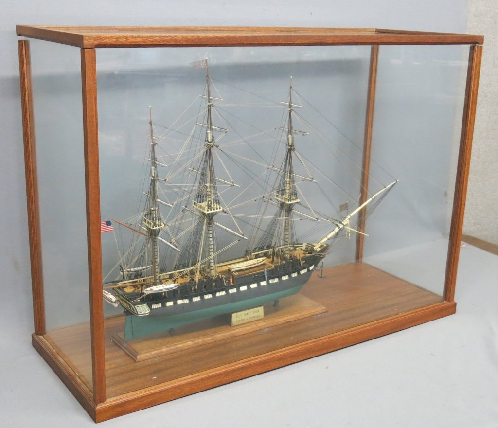 HANDCRAFTED SHIP MODEL OF THE USS CONSTITUTION: IN GLASSS CASE MEASURES 34 1/2" X 12 1/2" X 24 1/2"