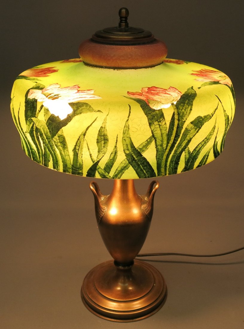 PAIRPOINT REVERSE PAINTED LAMP: BASE AND SHADE SIGNED; 21" TALL; SHADE MEASURES 13" IN DIAMETER AT RIM AND IS DECORATED ON BOTH THE INSIDE AND THE OUTSIDE; BASE MARKED PAIRPOINT D3025