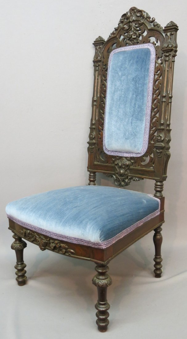VICTORIAN GOTHIC CARVED ROSEWOOD SLIPPER CHAIR: WITH BLUE VELVET SEAT AND BACK; 19" X 17" X 43"