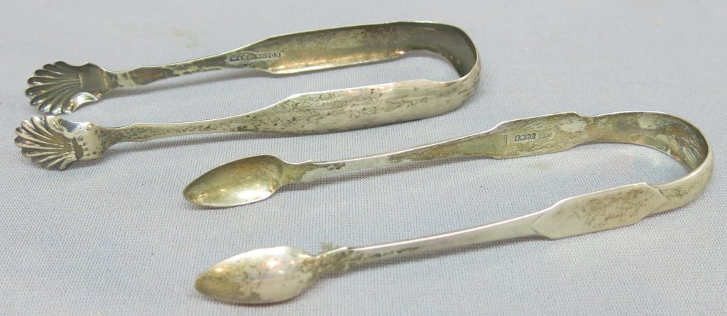 TWO PAIRS STERLING SILVER SUGAR TONGS: ONE PROBABLY BY WILLIAM LAW AND THOMAS TUDOR, DUBLIN; C. 1812; 2.79 OZT. TOTAL