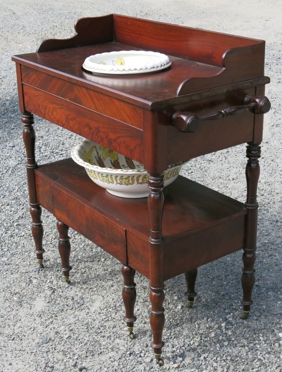 EMPIRE WALNUT WASHSTAND: WITH PULL OUT BIDET, TOWEL BARS, AND A COMPLEMENTING FURNIVALS 'LILY' PATTERN CHAMBER SET (SOME DAMAGE); 37" X 17" X 36 1/2"