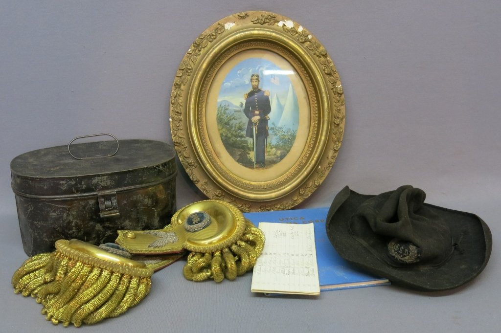 COLLECTION OF 19THC. ITEMS OF COLONEL WILLIAM DAVIES: UTICA, NY; INCL. WATERCOLOR ENHANCED PHOTO PORTRAIT (8" X 5 3/4"), EPAULETS IN TIN BOX (COLONEL) POST CIVIL WAR, 1861 NEW YORK VOLUNTEERS ROSTER LIST, HAT AND 20THC. UTICA CITIZENS CORP BOOK