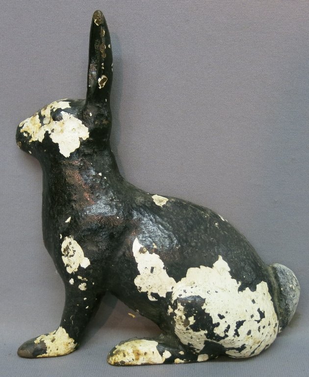 CAST IRON RABBIT DOORSTOP: 12" TALL; PAINTED BLACK OVER WHITE