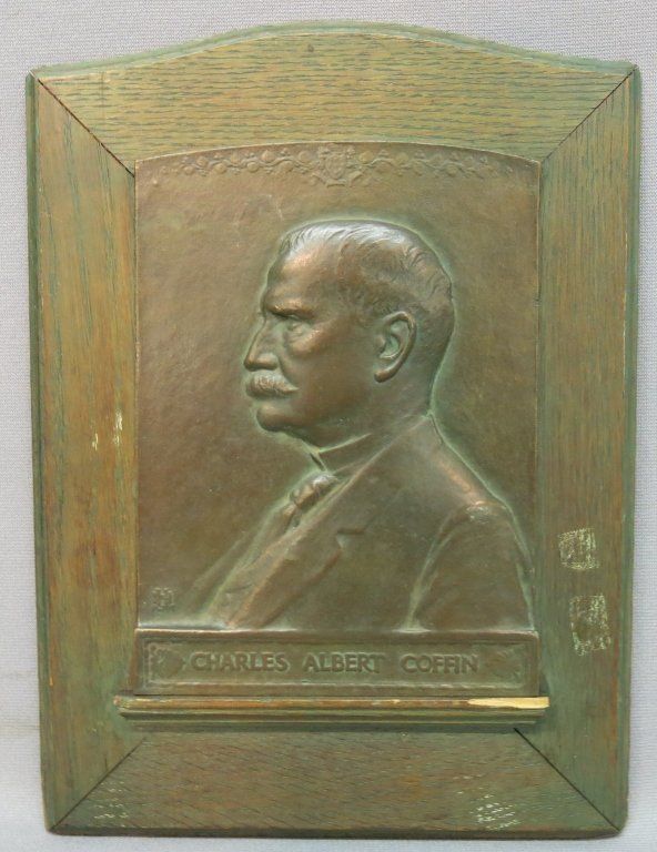 BRONZE PORTRAIT PLAQUE OF CHARLES ALBERT COFFIN: CO-FOUNDER AND FIRST PRESIDENT OF GENERAL ELECTRIC; PLAQUE MEASURES 7 1/2" X 5 3/4", FOUNDRY MARKED; OAK FRAMED
