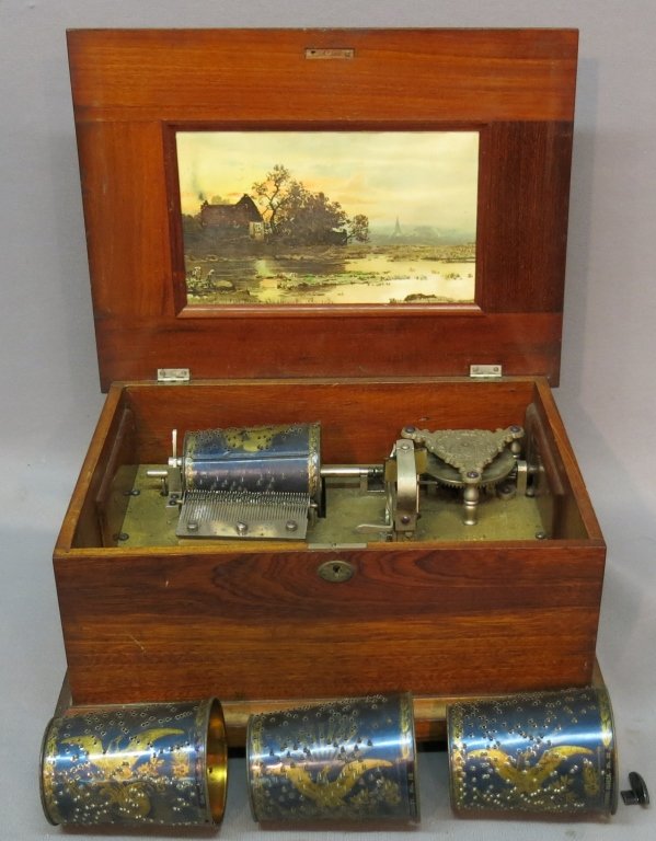 CAPITAL 'CUFF' CHERRY CASED MUSIC BOX MODEL A129: BY F.G. OTTO & SONS, NJ, WITH FOUR CUFF CYLINDER SONGS; 15" X 11 1/4" X 7"; SEEMS TO WORK WHEN TURNED, BUT THERE IS NO CRANK
