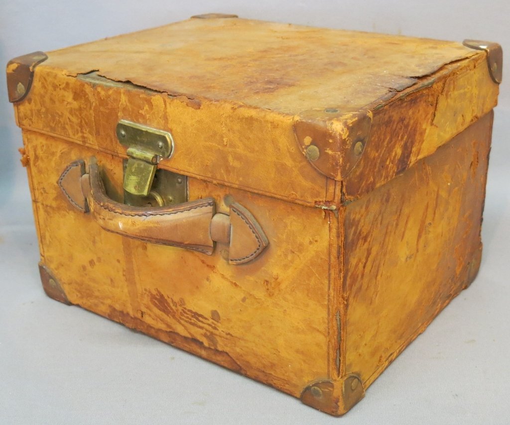 COLLINS & FAIRBANKS TOP HAT IN OLD LEATHER HATBOX: BOSTON, MA; BOX MEASURES 14" X 11" X 9 3/4"