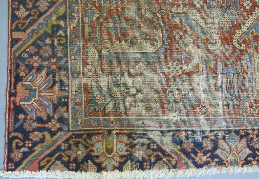 HERIZ AREA RUG: 6' 7" X 9', WORN