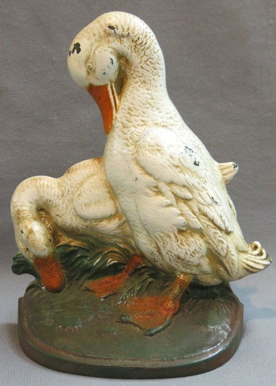 PAINTED CAST IRON DOORSTOP OF TWO GEESE (1 of 2)