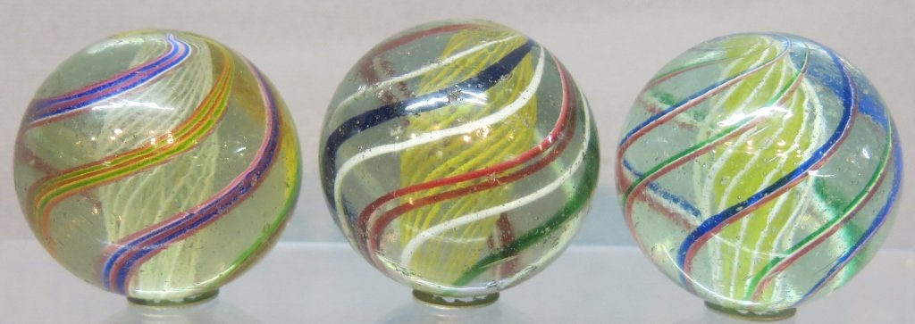 THREE LATTICINO CORE SWIRL MARBLES (1 of 2)