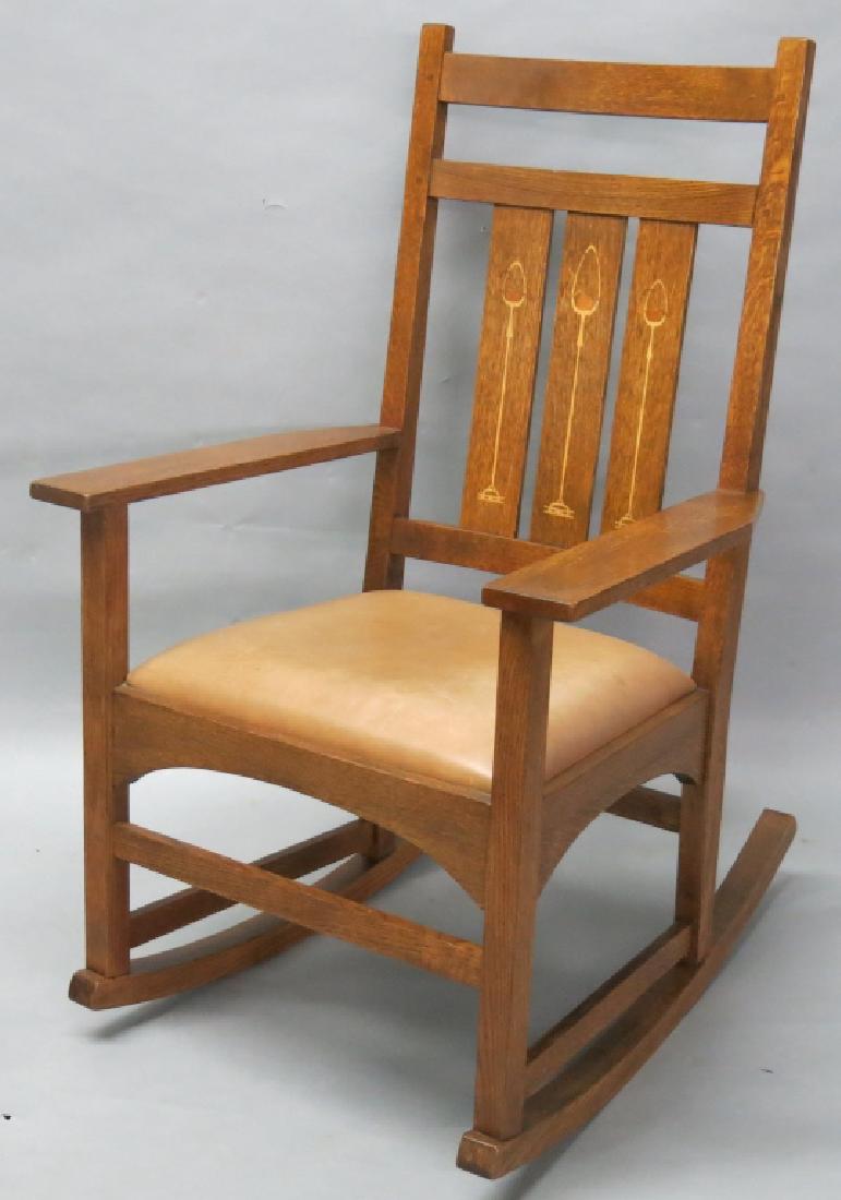 LATE 20TH C. STICKLEY OAK ROCKING CHAIR: LATE 20TH C. STICKLEY OAK ROCKING CHAIR WITH INLAID BACK SPLATS; 22" X 30" X 41 1/2"