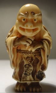 IVORY NETSUKE: 3 INCHES HIGH.