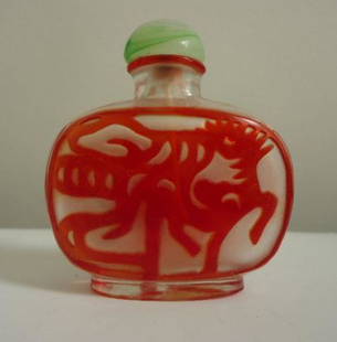 SNUFF BOTTLE: 2 INCHES HIGH.