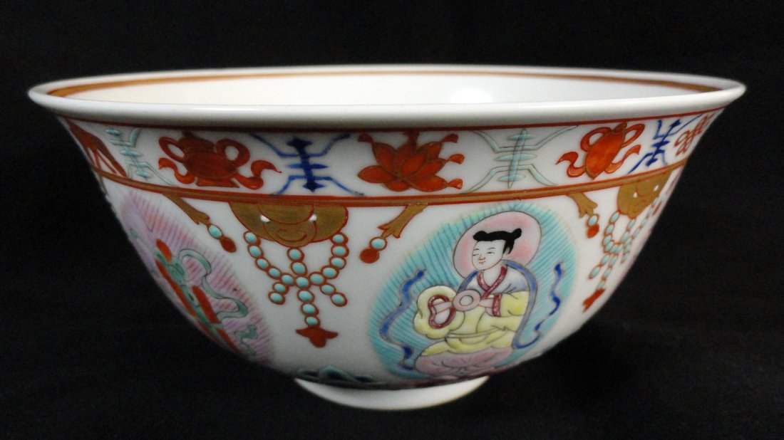 19th Century Chinese export Famille Rose Bowl: A Chinese Famille Rose vase decorated with various Buddhist emblems, signed at the underside, from the 19th Century. This bowl is 7 inches wide, in excellent condition.